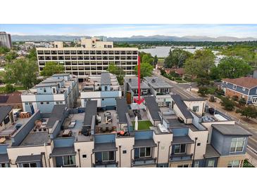 Modern townhomes offer rooftop patio with outdoor seating and city views at 3522 W 17Th Ave, Denver, CO 80204