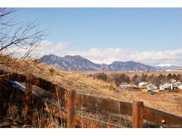 Scenic view of the mountains from the property, showcasing the natural beauty of the surrounding landscape at 9811 W 105Th Ave, Westminster, CO 80021