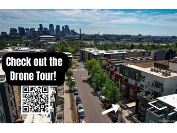 Drone shot of modern townhomes with a skyline view and street access at 2650 W Front View Crescent Dr # 101, Denver, CO 80211