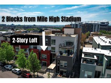 Modern multi-story loft near Mile High Stadium with balconies and contemporary design at 2650 W Front View Crescent Dr # 101, Denver, CO 80211