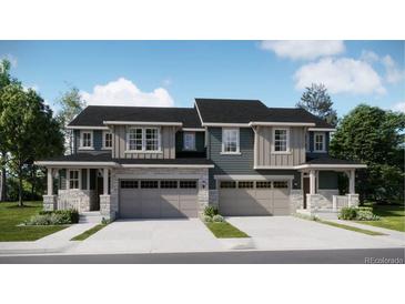 Charming paired home featuring a stone facade, covered entry, and two-car garage at 6731 Arbor E Blvd, Thornton, CO 80602