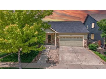 Charming single-Gathering home with well-maintained lawn and inviting curb appeal at 10181 E 112Th Way, Commerce City, CO 80640