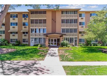 Well-maintained building with manicured lawn and inviting entrance perfect for comfortable living in this desirable neighborhood at 620 S Alton Way # 5B, Denver, CO 80247