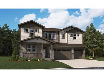 Charming two-story home featuring a covered porch, shake siding, three-car garage and mature landscaping at 8644 Pennycress Dr, Littleton, CO 80125
