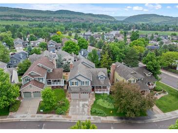 Charming neighborhood with mature trees, manicured lawns, and mountain views at 18 Blue Sage, Littleton, CO 80127