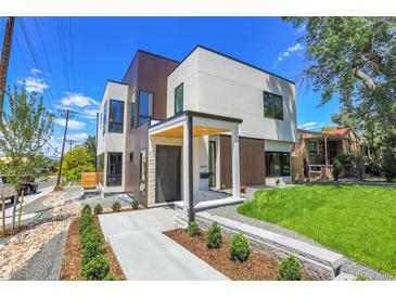 Modern two-story home with a sleek design, manicured lawn, and inviting entrance, perfect for contemporary living at 1491 S York St, Denver, CO 80210