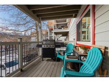 View of the balcony featuring a grill and outdoor seating perfect for relaxing or entertaining at 412 Main St # 2A3, Breckenridge, CO 80424