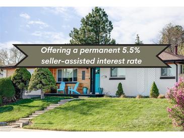 Charming single-story home with a well-manicured lawn, mature trees, and a welcoming blue front door at 11354 Allendale Dr, Arvada, CO 80004