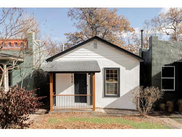 Charming craftsman bungalow with modern updates and a welcoming front porch at 1838 Race St, Denver, CO 80206