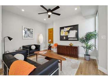 Bright living room with modern décor, hardwood floors, and stylish furnishings at 1286 Raleigh St, Denver, CO 80204