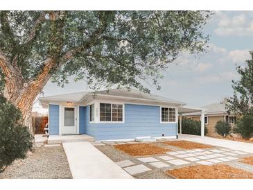 Charming light blue single-story home with mature tree and modern xeriscape front yard at 1825 S Adams St, Denver, CO 80210