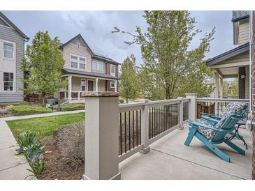 Inviting front porch with comfortable seating and charming architectural details, perfect for relaxing outdoors at 8917 Yates Dr, Westminster, CO 80031