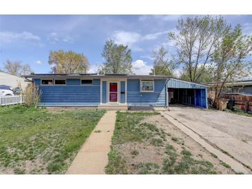 Charming single-story home with blue siding, red door, and driveway with carport and some grass at 41 Cortez St, Denver, CO 80221