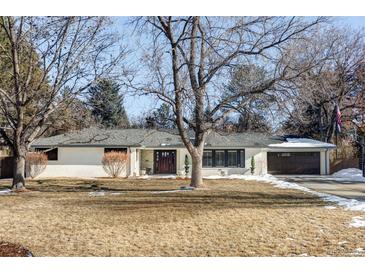 Beautiful Ranch home with a large front yard and attached garage at 3330 S Columbine Cir, Englewood, CO 80113