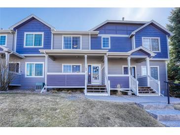 Multi-level townhouse featuring dual-tone exterior, front steps and walkway with a pleasant, neighborhood feel at 19225 E Carolina Pl # 102, Aurora, CO 80017