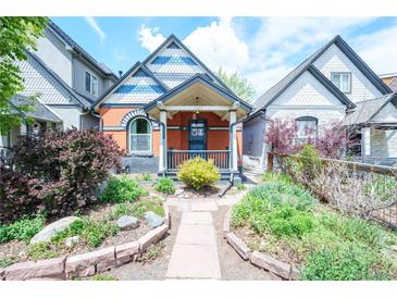 Charming home featuring a landscaped front yard with stone pathway at 4467 W 30Th Ave, Denver, CO 80212