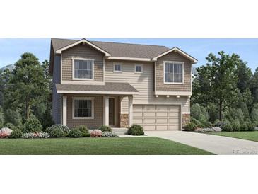 Inviting two-story home featuring neutral siding, a two-car garage, and a well-maintained front lawn at 6312 Las Conchas Pt, Parker, CO 80134