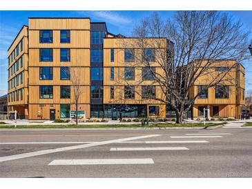 Apartment building featuring modern architecture and attractive landscaping, perfect for upscale urban living at 1601 Park Ave # 202, Denver, CO 80218