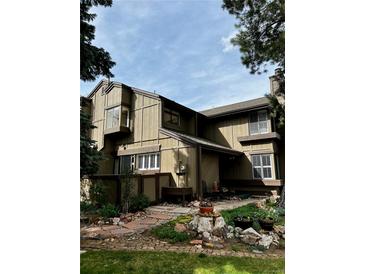 Charming two-story home with beautiful landscaping and inviting curb appeal at 10732 W Florida Ave # B, Lakewood, CO 80232