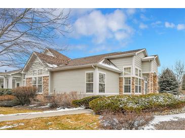 Charming single-Gathering home showcasing stone accents and beautiful architectural design at 8300 Fairmount Dr # Ff104, Denver, CO 80247