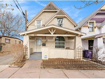 Quaint craftsman home with a welcoming front porch and well-manicured yard at 2219 W 33Rd Ave, Denver, CO 80211