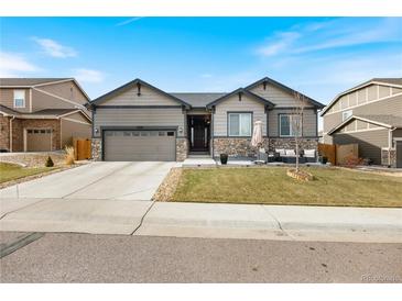 Attractive Ranch style home with a landscaped yard and two-car garage at 12551 Tamarac St, Thornton, CO 80602