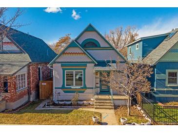 Charming home with unique architectural details and colorful accents at 3613 Julian St, Denver, CO 80211