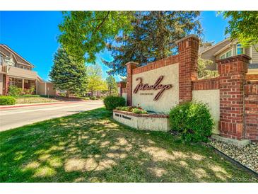 Attractive brick and stone sign welcomes you to the Barclay Condominiums community under mature shade trees at 4760 S Wadsworth Blvd # 302, Littleton, CO 80123