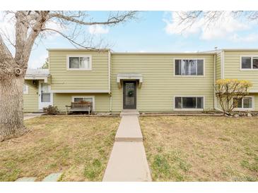 Charming condo featuring a well-maintained front yard, inviting entryway, and convenient bench seating at 5721 W 92Nd Ave # 53, Westminster, CO 80031