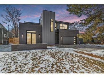 Modern two-story home with gray siding and a sleek design at 3289 S Eudora St, Denver, CO 80222