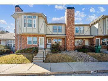 Charming two-story townhome featuring brick facade, neutral trim, and well-maintained landscaping at 3006 W 107Th Pl # D, Westminster, CO 80031