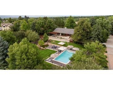 Luxury home with pool and landscaped grounds at 6200 Charrington Dr, Cherry Hills Village, CO 80111