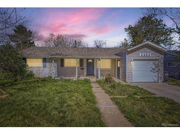 Charming single-story home with a well-manicured lawn and attached one-car garage at 3353 S Glencoe St, Denver, CO 80222