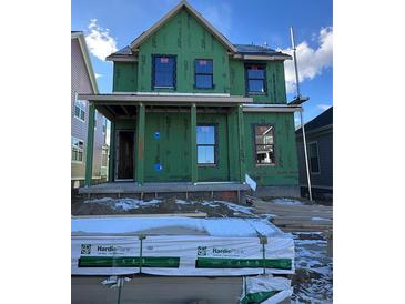 Two-story craftsman style home with front porch and HardiePlank siding at 240 Sassafras St, Erie, CO 80516