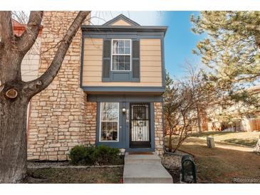 Charming home featuring a stone accent wall and a well-maintained front yard at 2927 W 81St Ave # H, Westminster, CO 80031