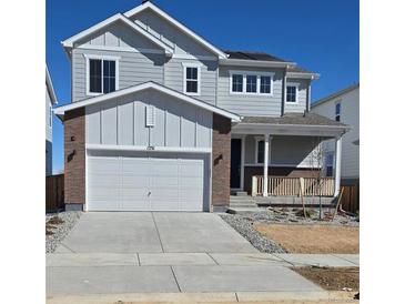 Charming two-story home with a covered front porch and a two car garage at 1231 Loraine N Cir, Lafayette, CO 80026