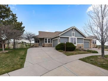 Charming single-Gathering home boasts a well-maintained lawn and inviting curb appeal at 7713 S Zante Ct, Aurora, CO 80016