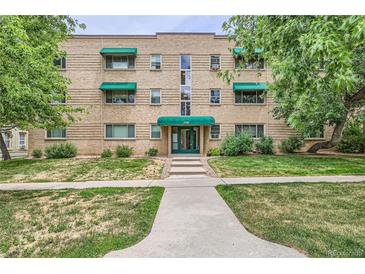 Attractive multi-Gathering building featuring awnings, landscaping, and a welcoming entrance at 2100 N Franklin St # 20, Denver, CO 80205