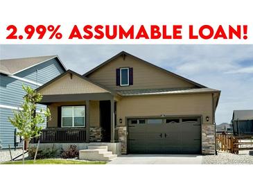 Charming single-Gathering home featuring a well-manicured lawn and a two-car garage, offered with an assumable loan at 222 Fox St, Bennett, CO 80102
