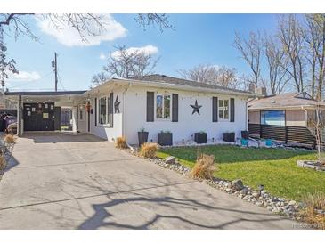Charming single-story home featuring a covered carport and well-maintained front yard at 1325 S Clermont St, Denver, CO 80222
