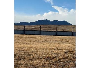 Expansive land with mountain views and a fence, perfect for building your dream home at 2855 Rock Creek Cir # 129, Superior, CO 80027
