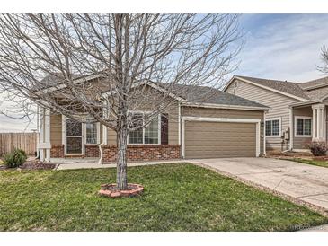 Charming single-Gathering home with a well-manicured lawn, an attached garage, and a welcoming curb appeal at 5490 Suffolk Ave, Castle Rock, CO 80104