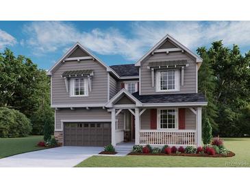Charming two-story home featuring a covered porch, attached garage, and professional landscaping at 1361 Lumber Ridge N Cir, Erie, CO 80516
