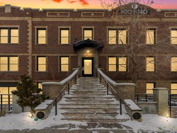 Brick building exterior with stairs leading to the entrance at 740 N Sherman St # 208, Denver, CO 80203