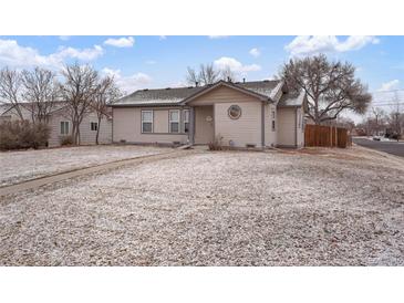 Charming single-story home with a well-maintained lawn and sidewalk access, nestled on a corner lot at 3390 S Elm St, Denver, CO 80222