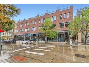 Attractive brick building featuring retail space on the first floor and residential units above at 4144 Tennyson St # 10, Denver, CO 80212