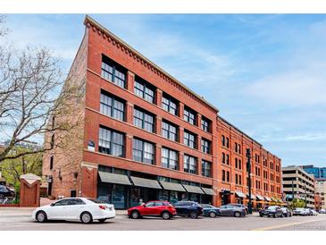 Stunning brick building with large windows and street parking in an urban area at 1745 Wazee St # 5E, Denver, CO 80202
