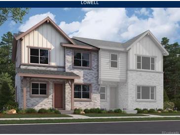 Charming two-story home featuring brick and siding and well-manicured landscaping at 3875 W 82Nd Ln, Westminster, CO 80031