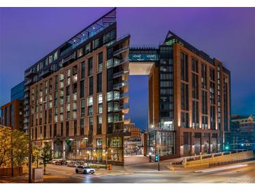 Striking exterior view of a contemporary building with a unique skybridge connecting the two towers at 1901 Wazee St # 1020, Denver, CO 80202