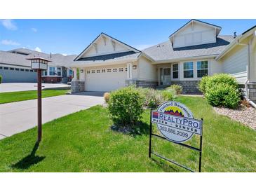 Charming single-Gathering home with a well-maintained lawn and a two-car garage, located in a friendly neighborhood at 7879 S Zante Ct, Aurora, CO 80016